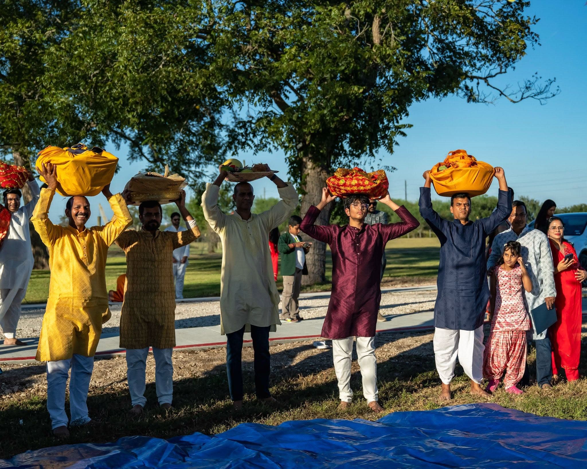 Community members celebrating together at Chhath Puja